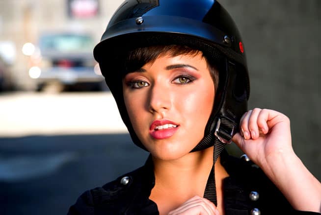 Young lady wearing a helmet